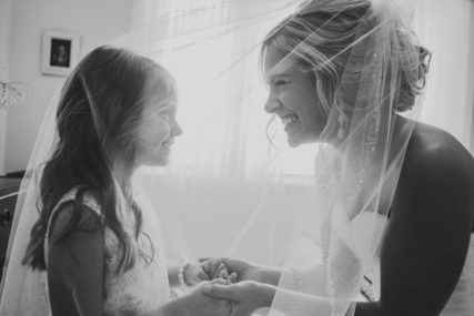 Black-and-White-Wedding-Photo-_-Bride-and-Flower-Girl-_-Black-and-White-Candid-Photo