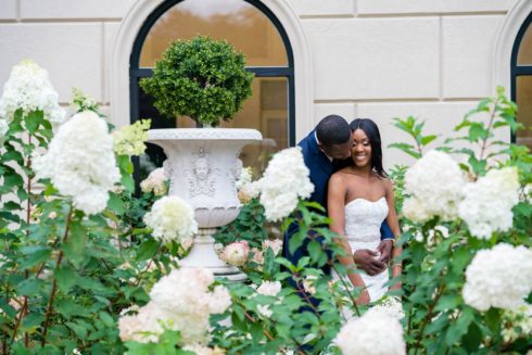 Wedding-Highlights-_-Bride-and-Groom-_-Romantic-Wedding-Photo-_-Bride-and-Groom-in-a-Garden-_-Bride-and-Groom-with-Flowers-_-Bride-and-Groom-Surrounded-by-Flowers