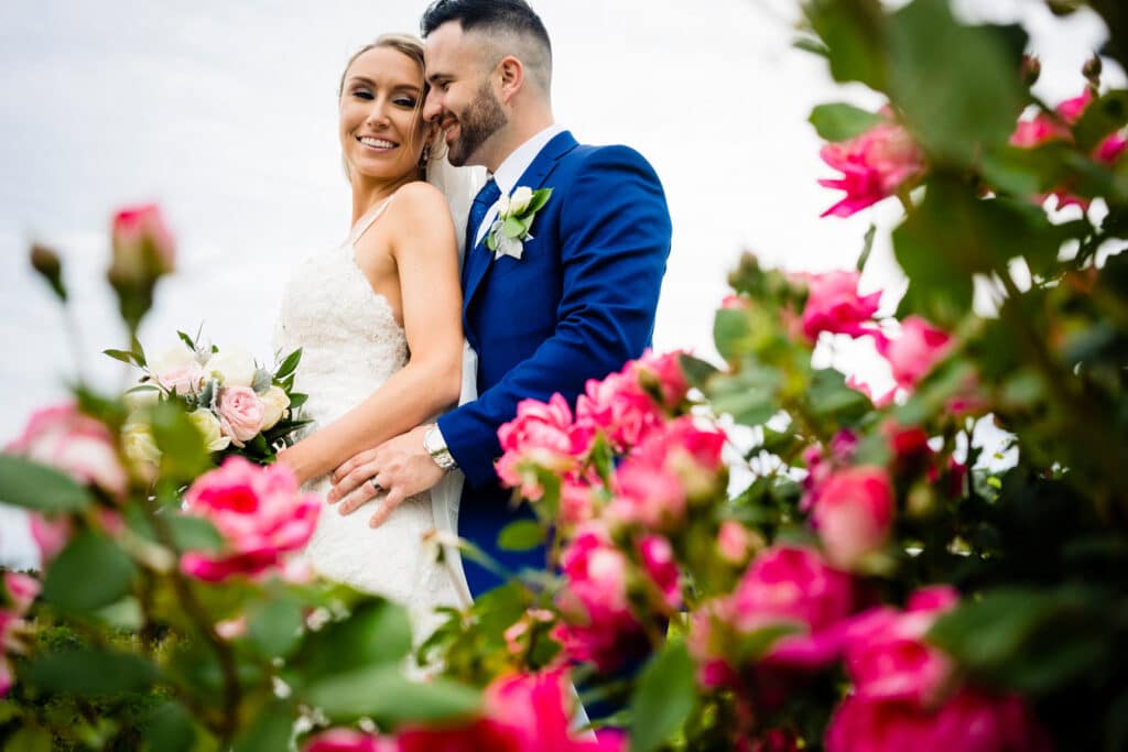 Bride and Groom In Flower Garden