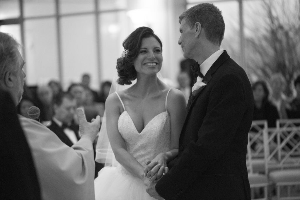 Bride and Groom getting married at Glen Island Harbor Club