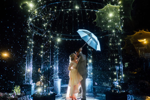 bride and groom with umbrella