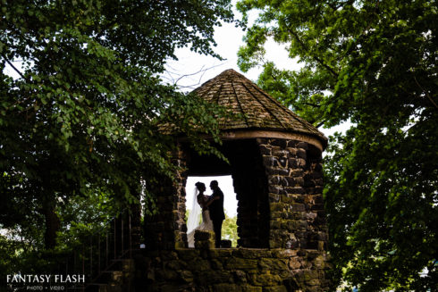 bride and groom in gazebo at glen island park in new rochelle