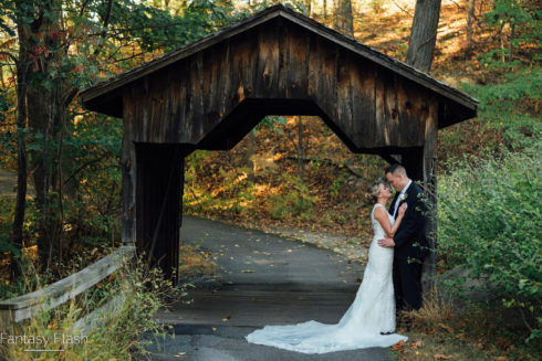 Bride and Groom posing in front of overpass in hudson valley NY