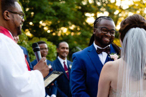 couple getting married outside at Le Chateau