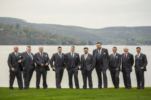 Groomsmen posing in front of Lake Candlewood