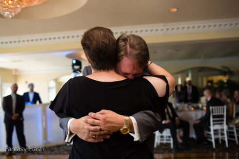 emotional moment between a groom and his mother