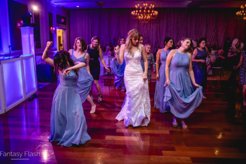 Bride and Bridesmaids Dancing