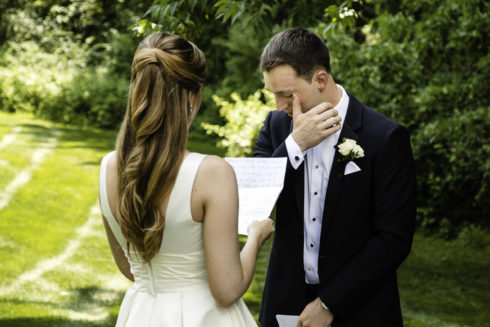 intimate candid moment between a bride and groom