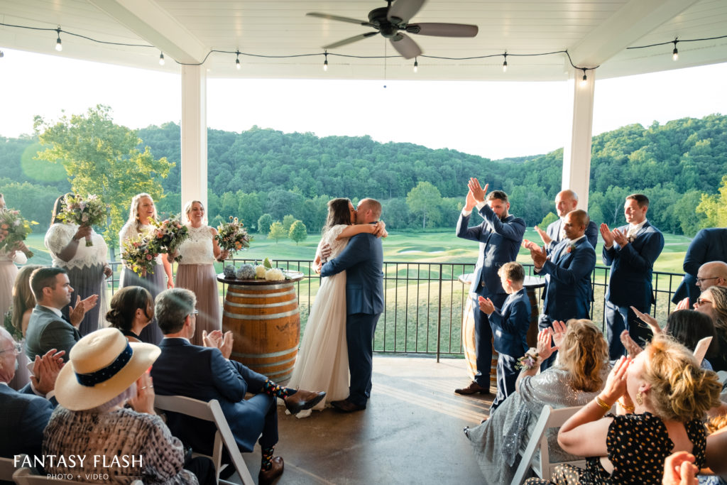 Bride and groom kissing - hollow brook golf club virtual tour