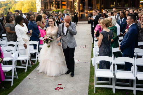 emotional father of the bride walking daughter down the isle