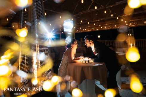 candid shot of a bride and groom on patio at the villa borghese