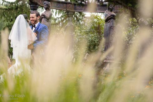 bride and groom at gazebo