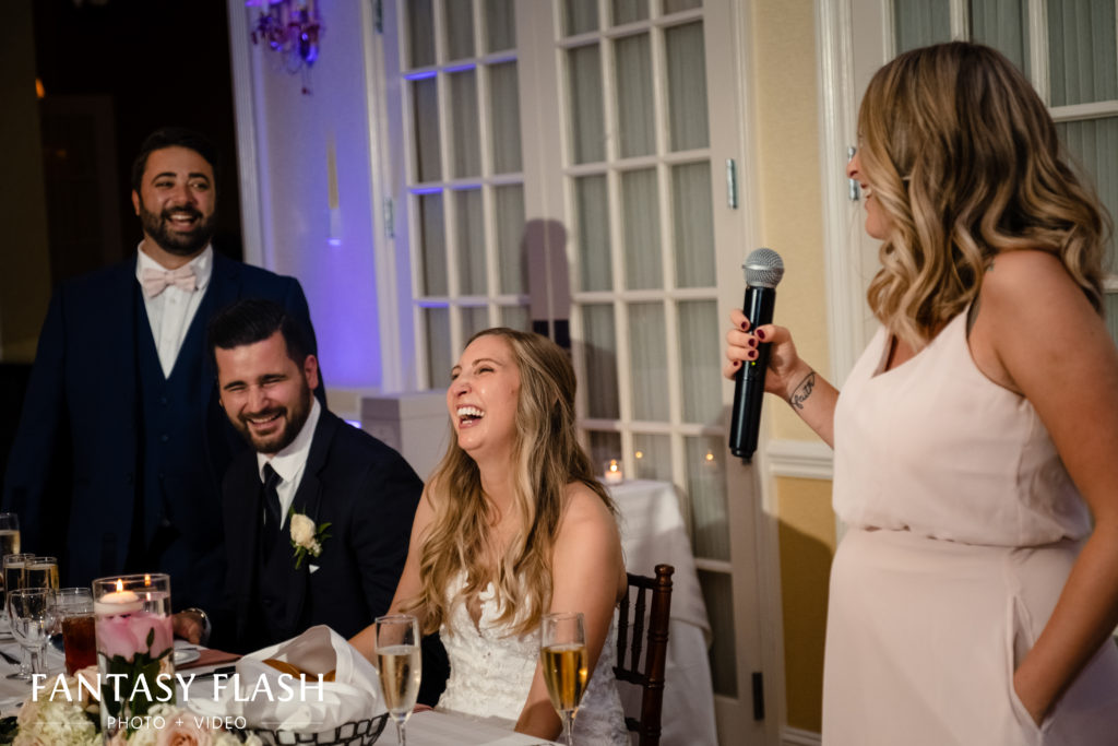 Maid of Honor toasting Bride and Groom