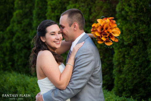 a bride and groom posing for wedding portraits at Anthonys Pier 9
