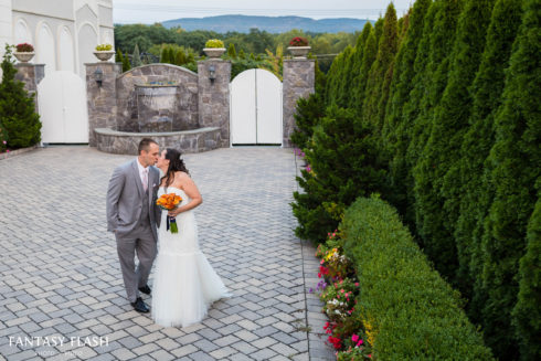 a bride and groom on the patio