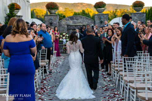 A bride walking down the isle at Anthonys Pier 9