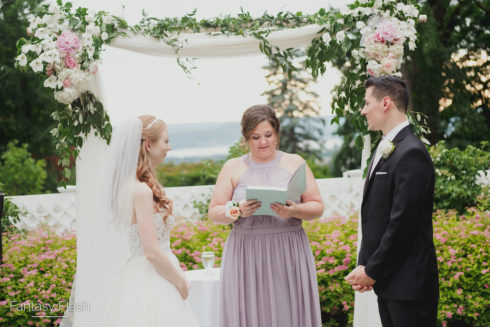 a bride and groom reciting wedding vows at The Briarcliff Manor