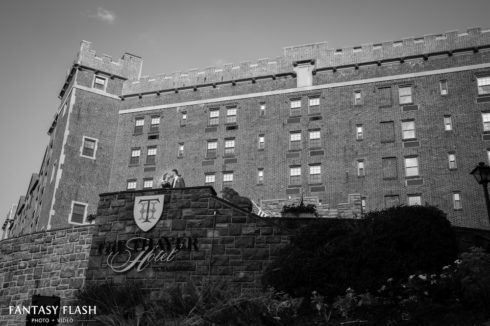 a bride and groom posing for wedding photos at The Thayer Hotel