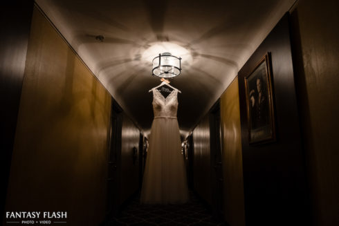 wedding dress hanging in hallway of The Thayer Hotel