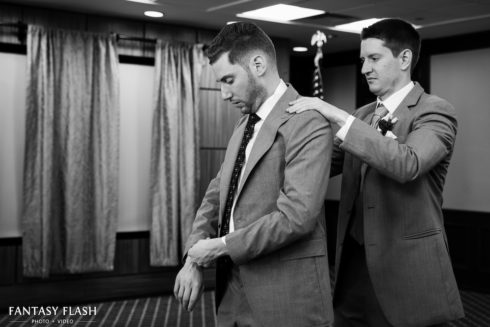 A groom getting ready at The Thayer Hotel