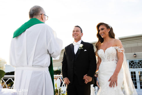 a bride and groom getting married at the VIP Country Club in New Rochelle