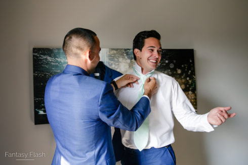 groom getting ready at West Hills Country Club