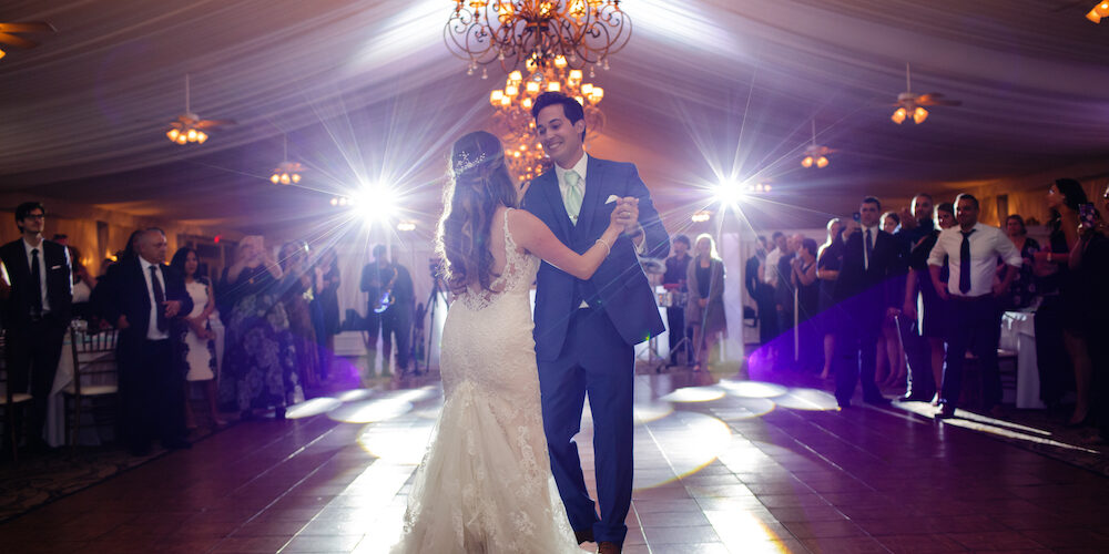 a first dance in the outdoor ballroom at West Hills Country Club