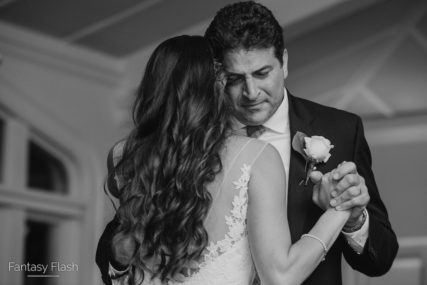 A bride dancing with her father