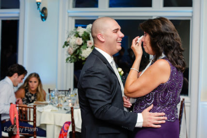 A groom dancing with his mother at Whitby Castle